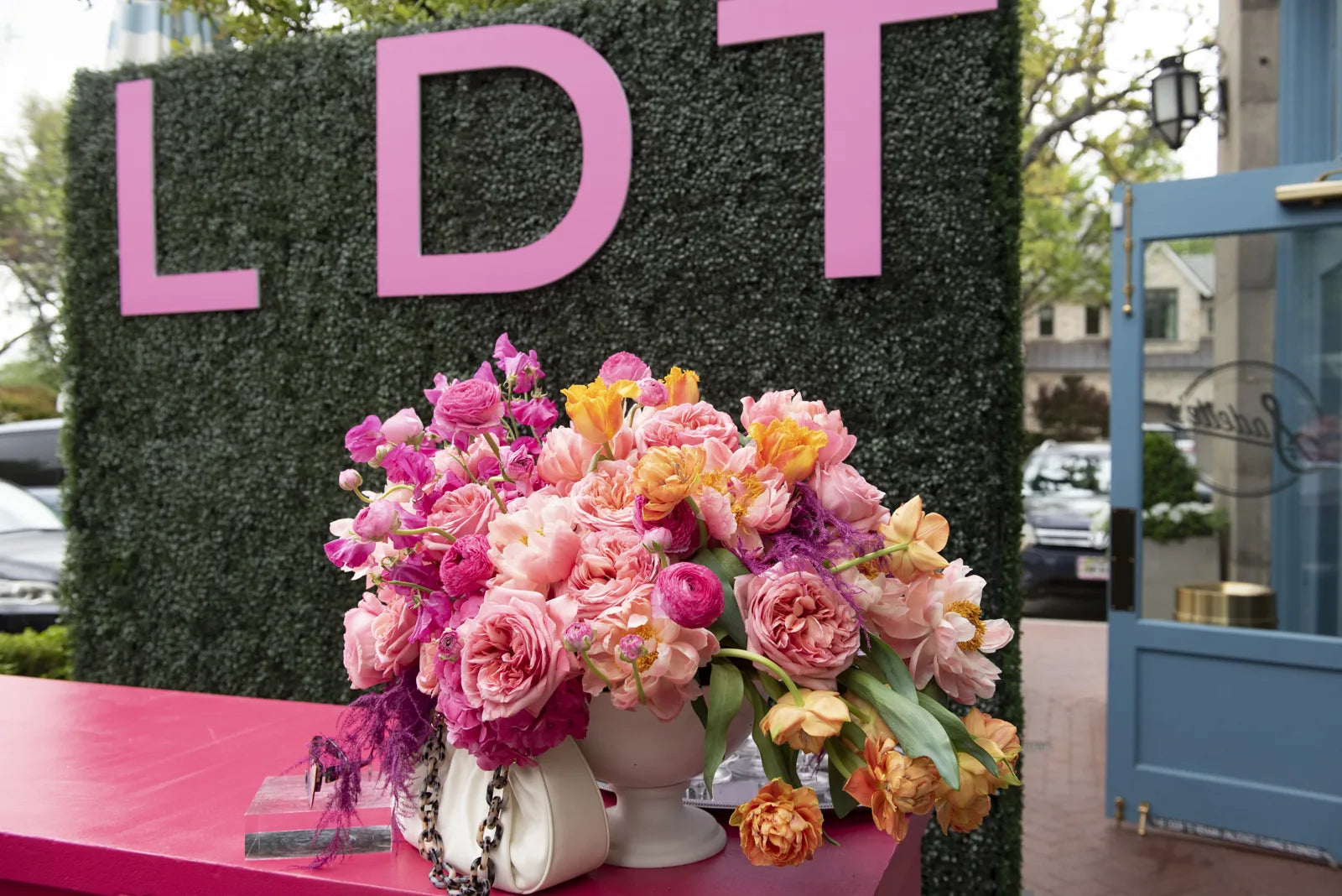 Pink branded floral display