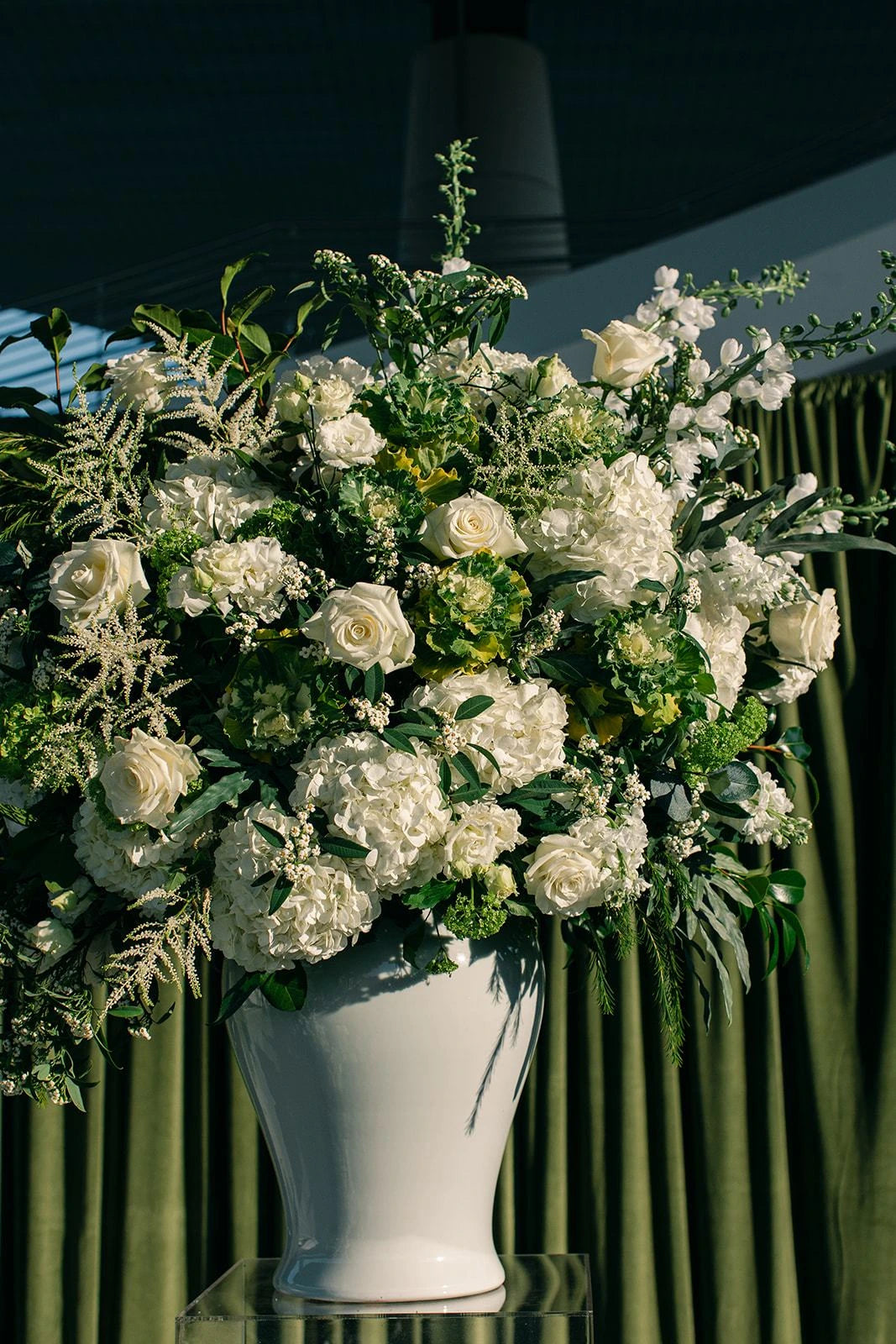 White garden roses and greenery