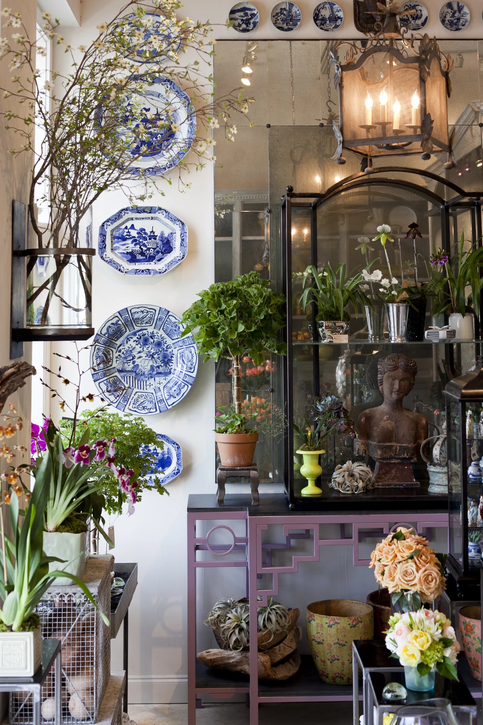 Flowers and collected objects inside Avant Garden